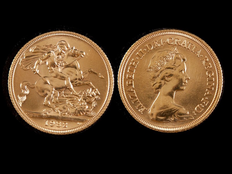 LIBRA EM OURO - RAINHA ISABEL II
