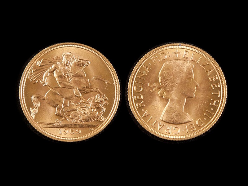 LIBRA EM OURO - RAINHA ISABEL II