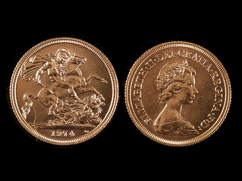 LIBRA EM OURO - RAINHA ISABEL II