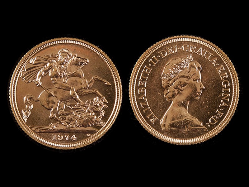 LIBRA EM OURO - RAINHA ISABEL II