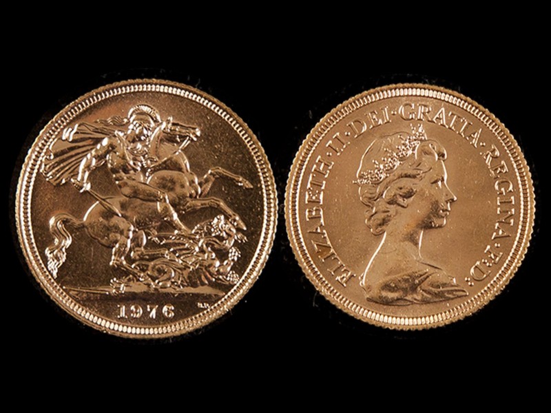 LIBRA EM OURO - RAINHA ISABEL II
