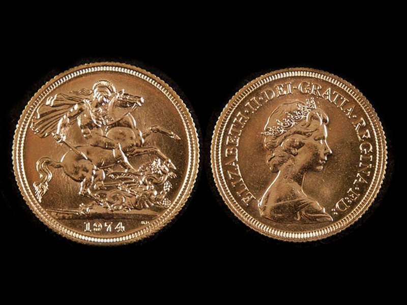 LIBRA EM OURO - RAINHA ISABEL II