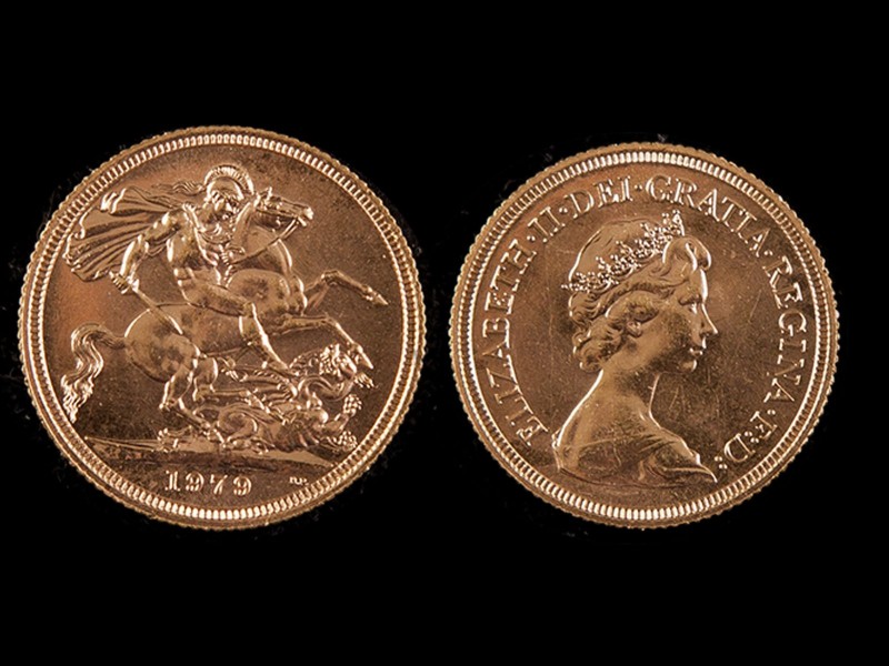 LIBRA EM OURO - RAINHA ISABEL II