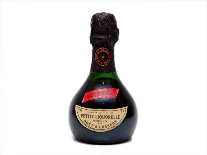 INVULGAR GARRAFA DE LICOR