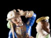 CASAL DE FIGURAS ILUSTRES EM CENAS GALANTES